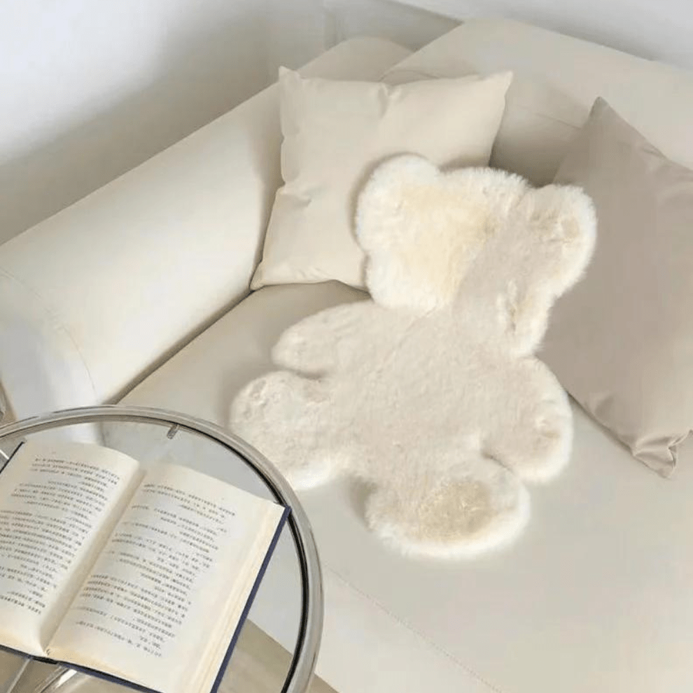 Plush mat with a teddy bear design