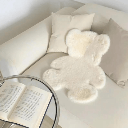 Plush mat with a teddy bear design