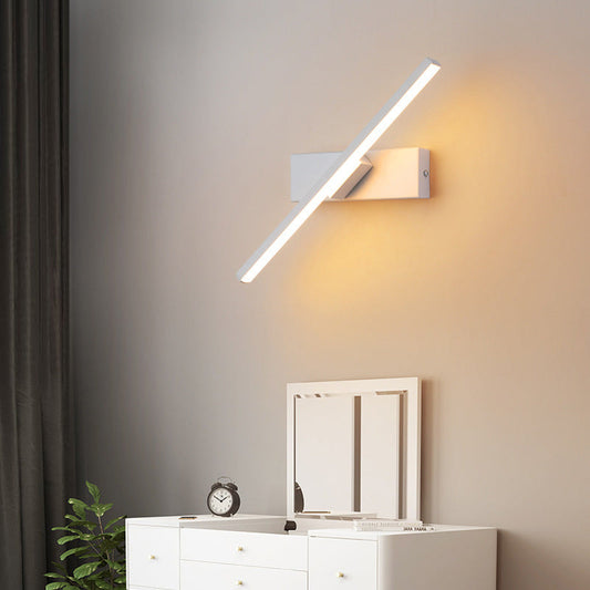 LED wall light with a swiveling arm