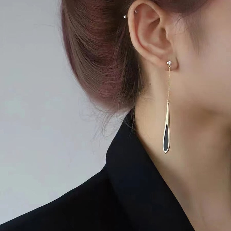 Boucles d’oreilles pendantes à franges noires