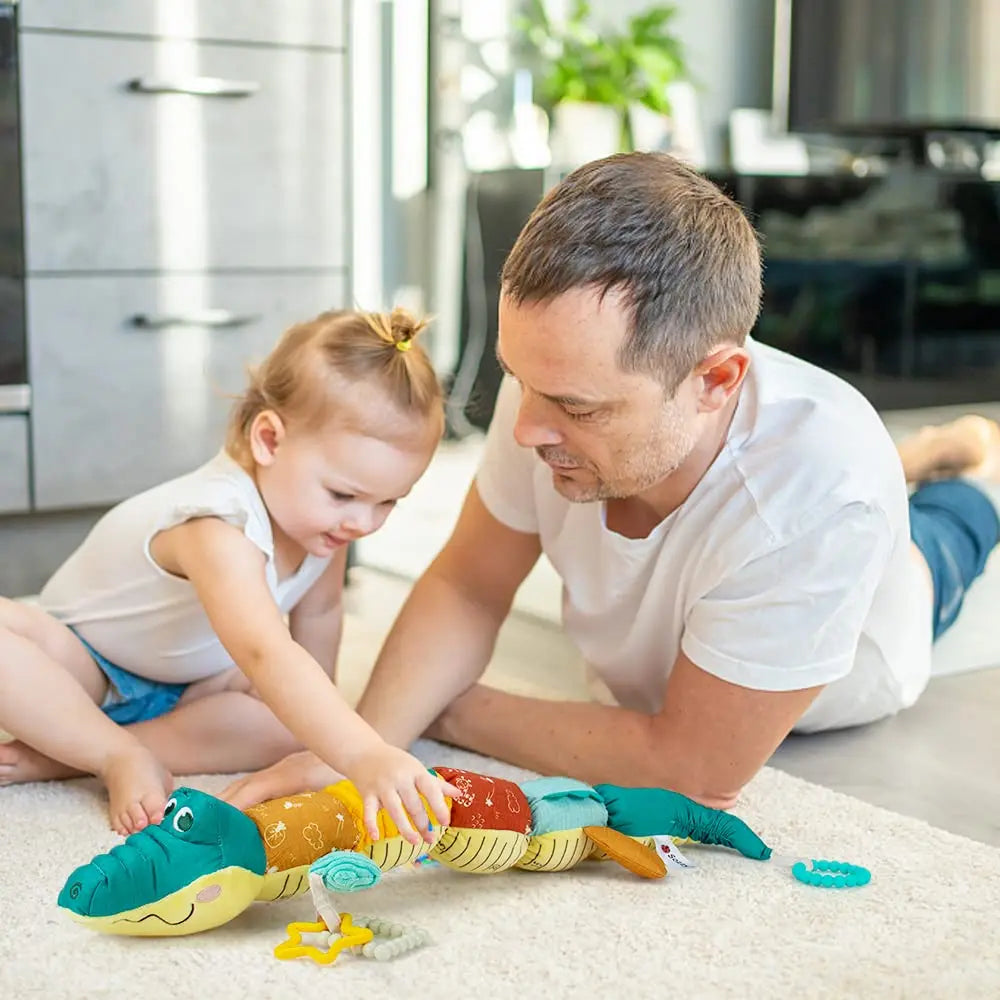 Crocodile sensoriel en peluche
