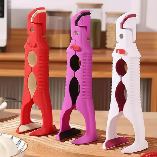 Kitchen tongs with a bottle opener