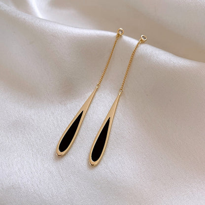Boucles d’oreilles pendantes à franges noires