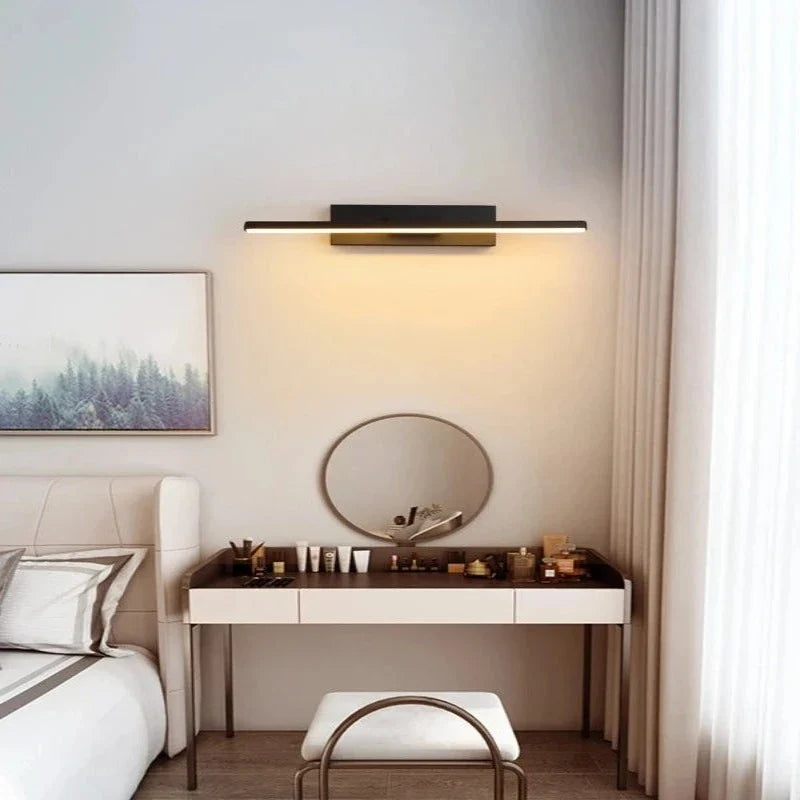 LED wall light with a swiveling arm