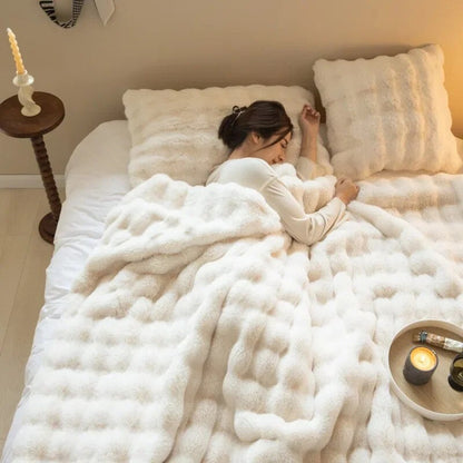 Plush blanket with a soft surface