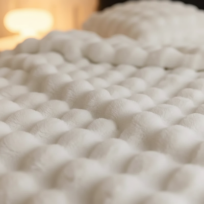 Plush blanket with a soft surface