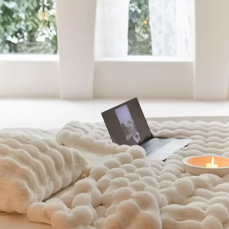 Plush blanket with a soft surface