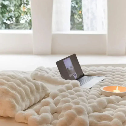 Plush blanket with a soft surface
