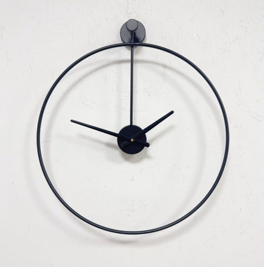 Round black wall clock