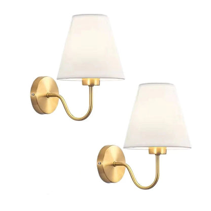 Wall light with a lampshade and gold arm