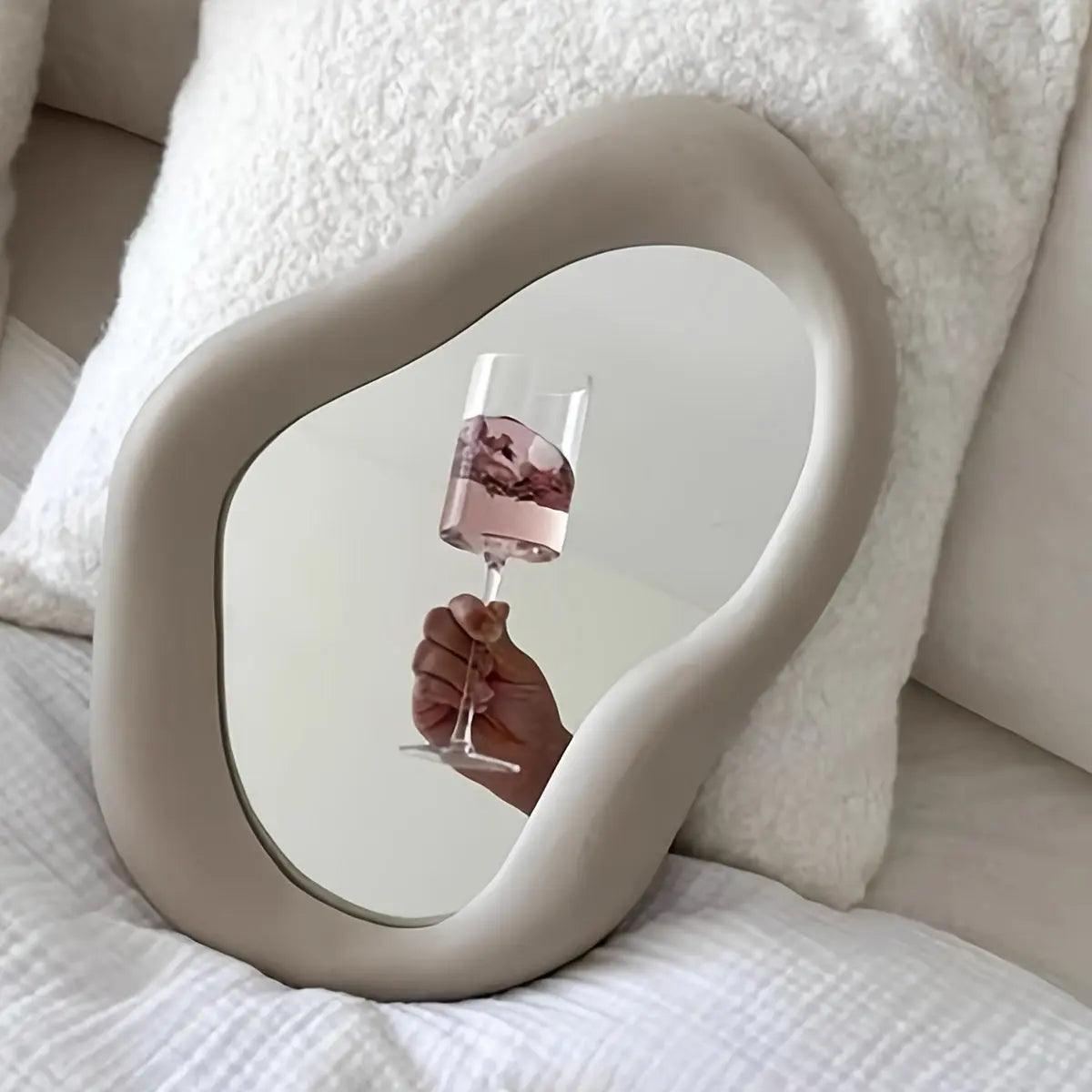 Irregular cosmetic mirror