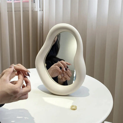 Irregular cosmetic mirror
