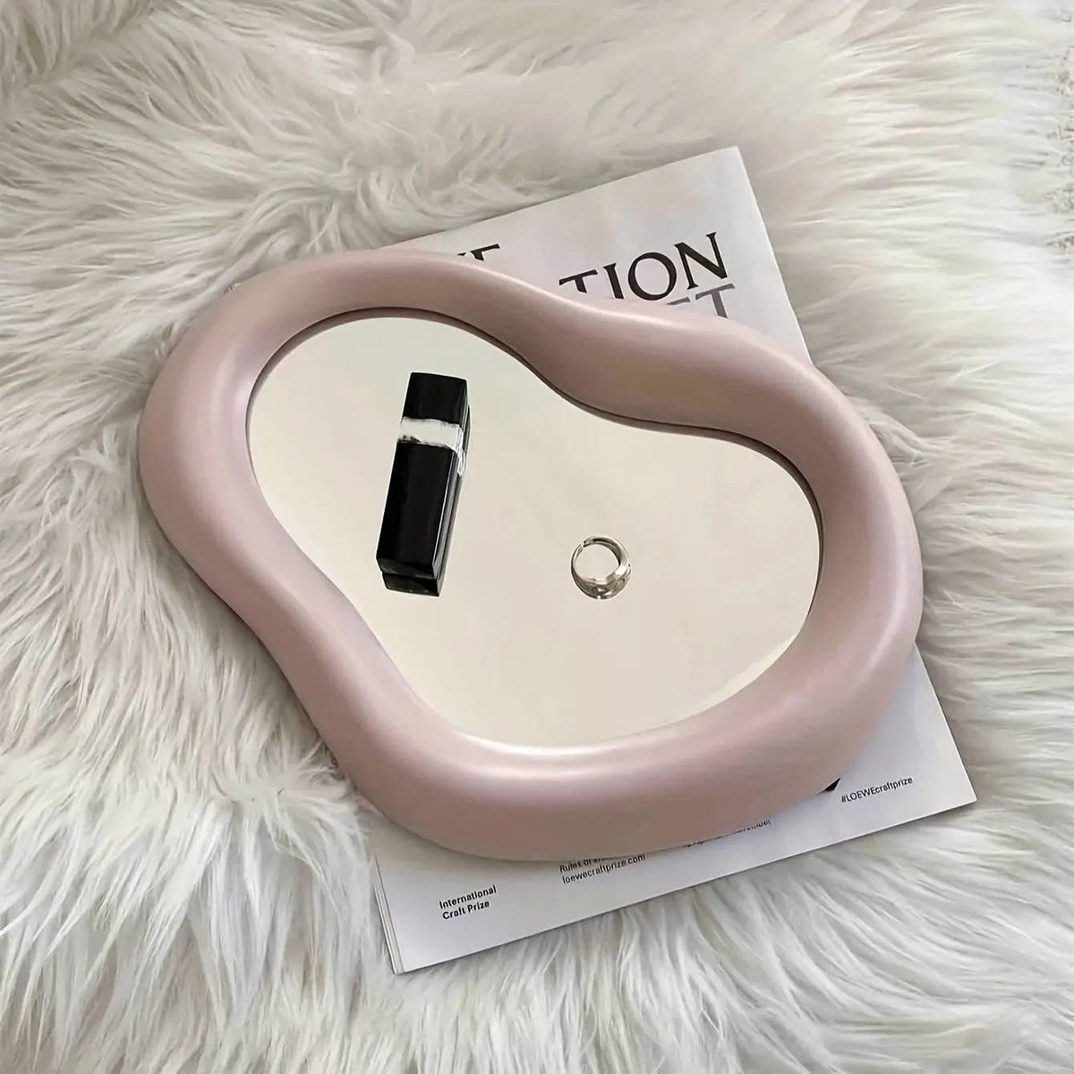 Irregular cosmetic mirror
