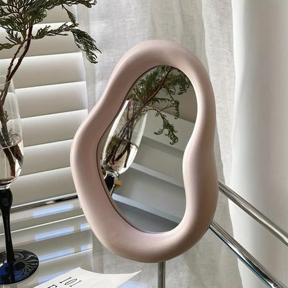 Irregular cosmetic mirror