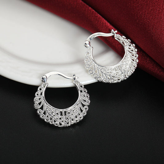 Boucles d’oreilles créoles à motif floral
