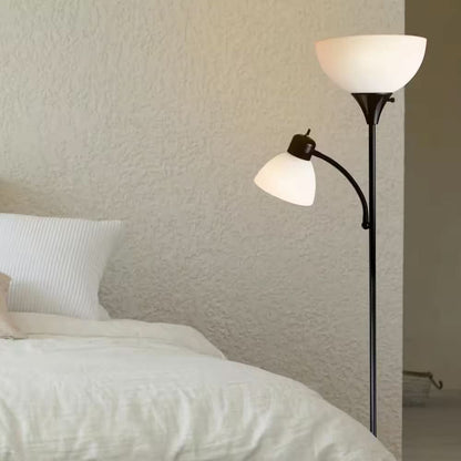 Floor lamp with a milky glass shade