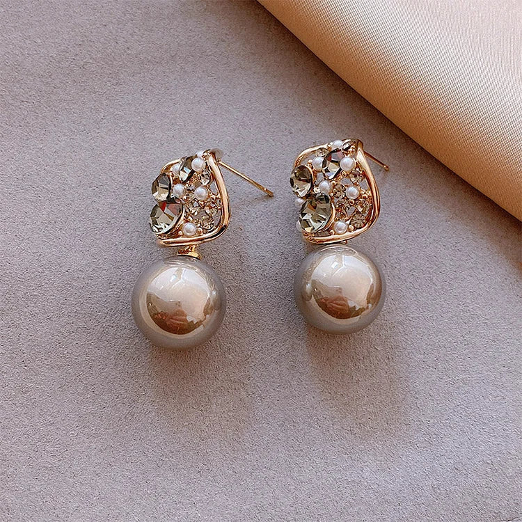 Boucles d’oreilles ornées de cristaux et de perles