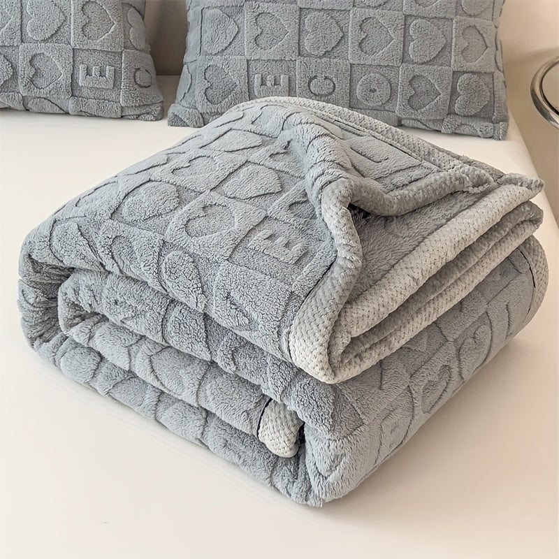 Couverture polaire avec motif de cœurs