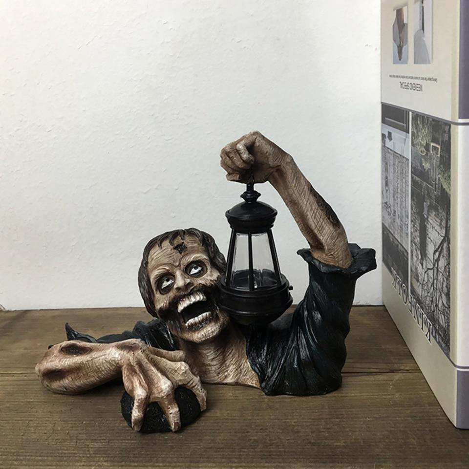 Figurka zombie s LED lampionem
