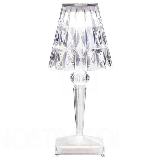 Table lamp with a faceted shade and USB port