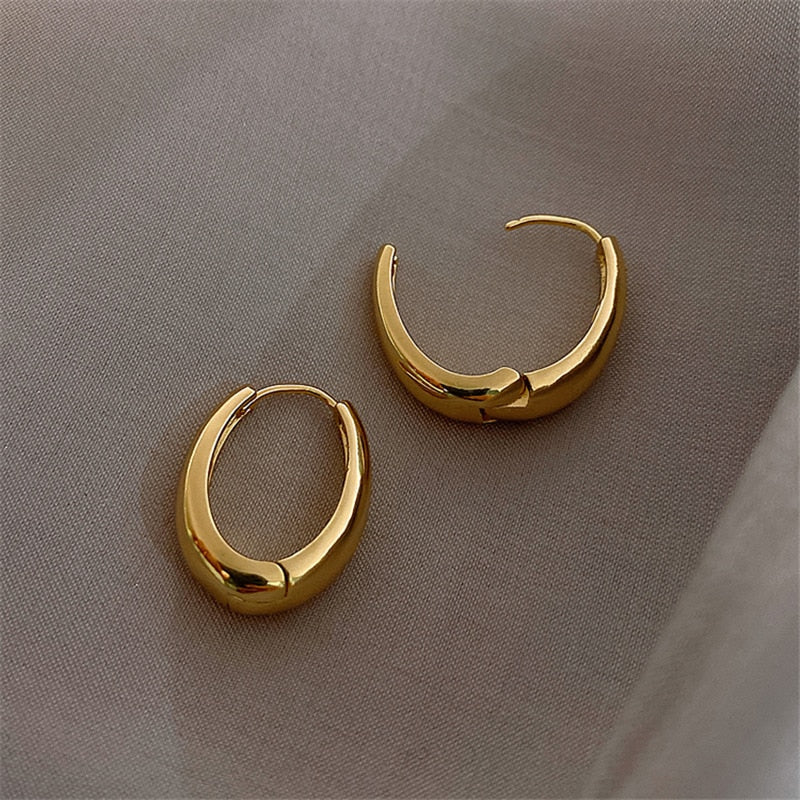 Boucles d’oreilles créoles rondes dorées