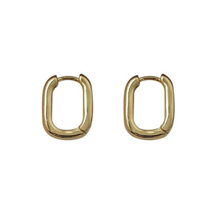 Clous d’oreilles géométriques dorés