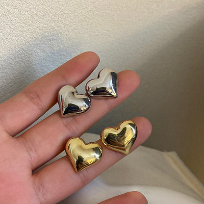 Clous d’oreilles cœur bicolores