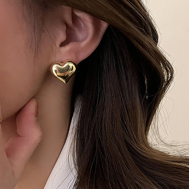 Clous d’oreilles cœur bicolores