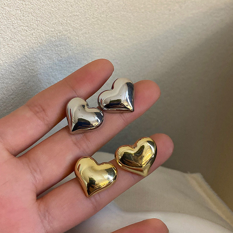 Clous d’oreilles cœur bicolores