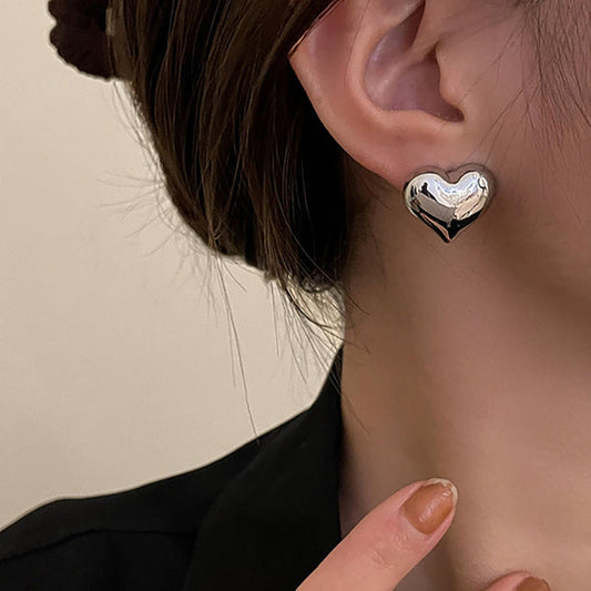 Clous d’oreilles cœur bicolores
