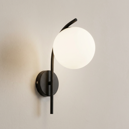 Wall lamp with a spherical shade