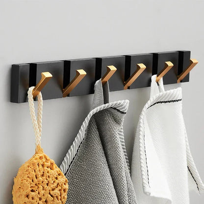 Wall-mounted coat rack with folding hooks