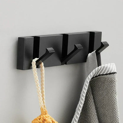 Wall-mounted coat rack with folding hooks