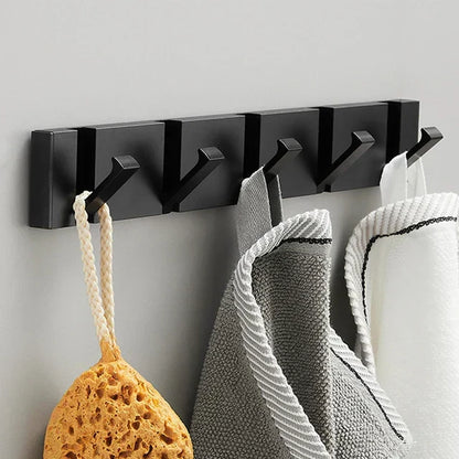 Wall-mounted coat rack with folding hooks