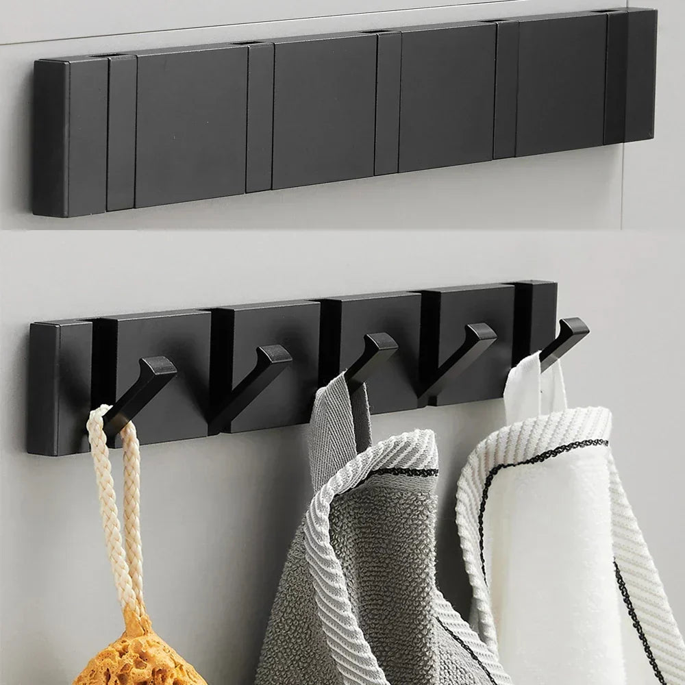 Wall-mounted coat rack with folding hooks