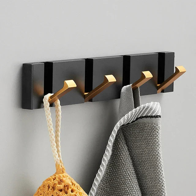 Wall-mounted coat rack with folding hooks