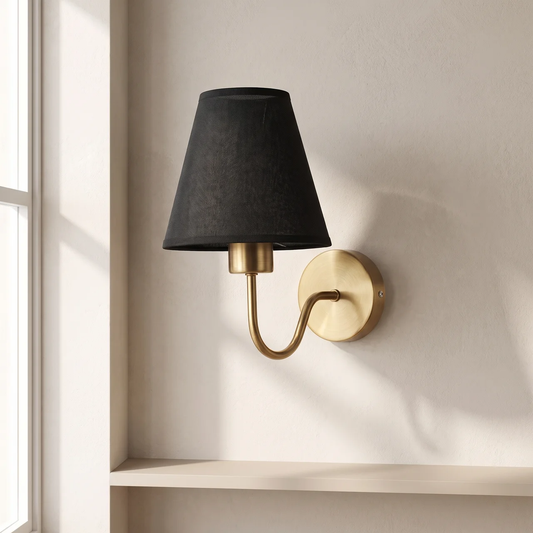 Wall light with a lampshade and gold arm