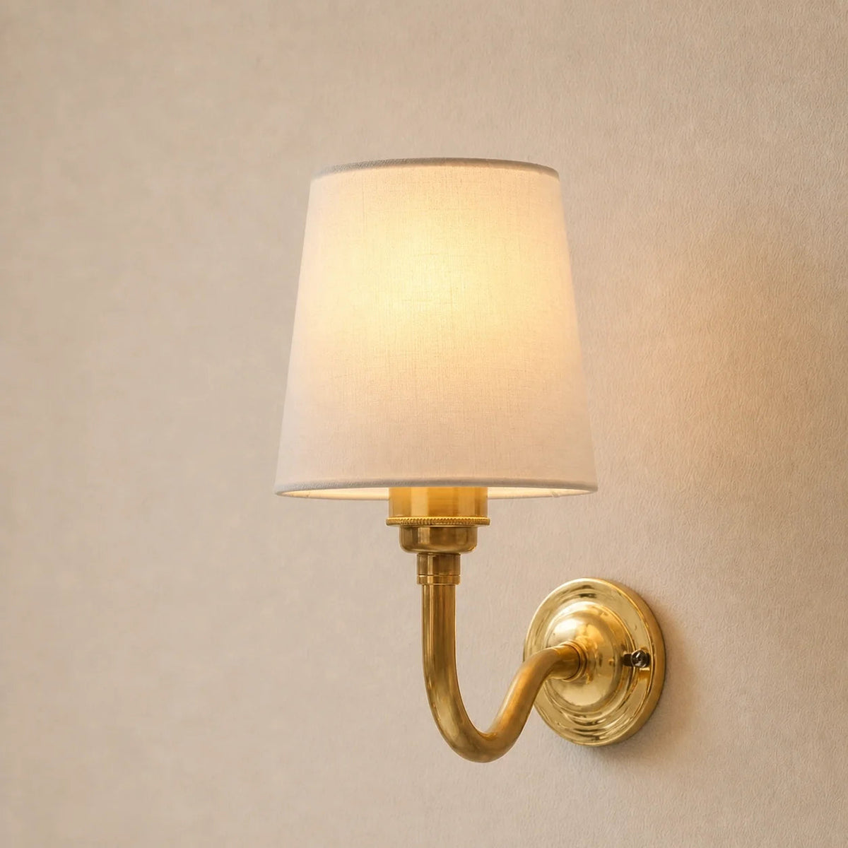 Brass wall sconce