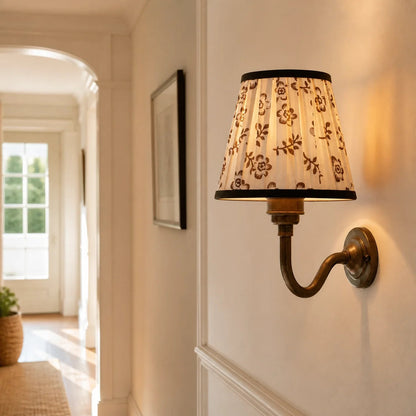 Brass wall sconce