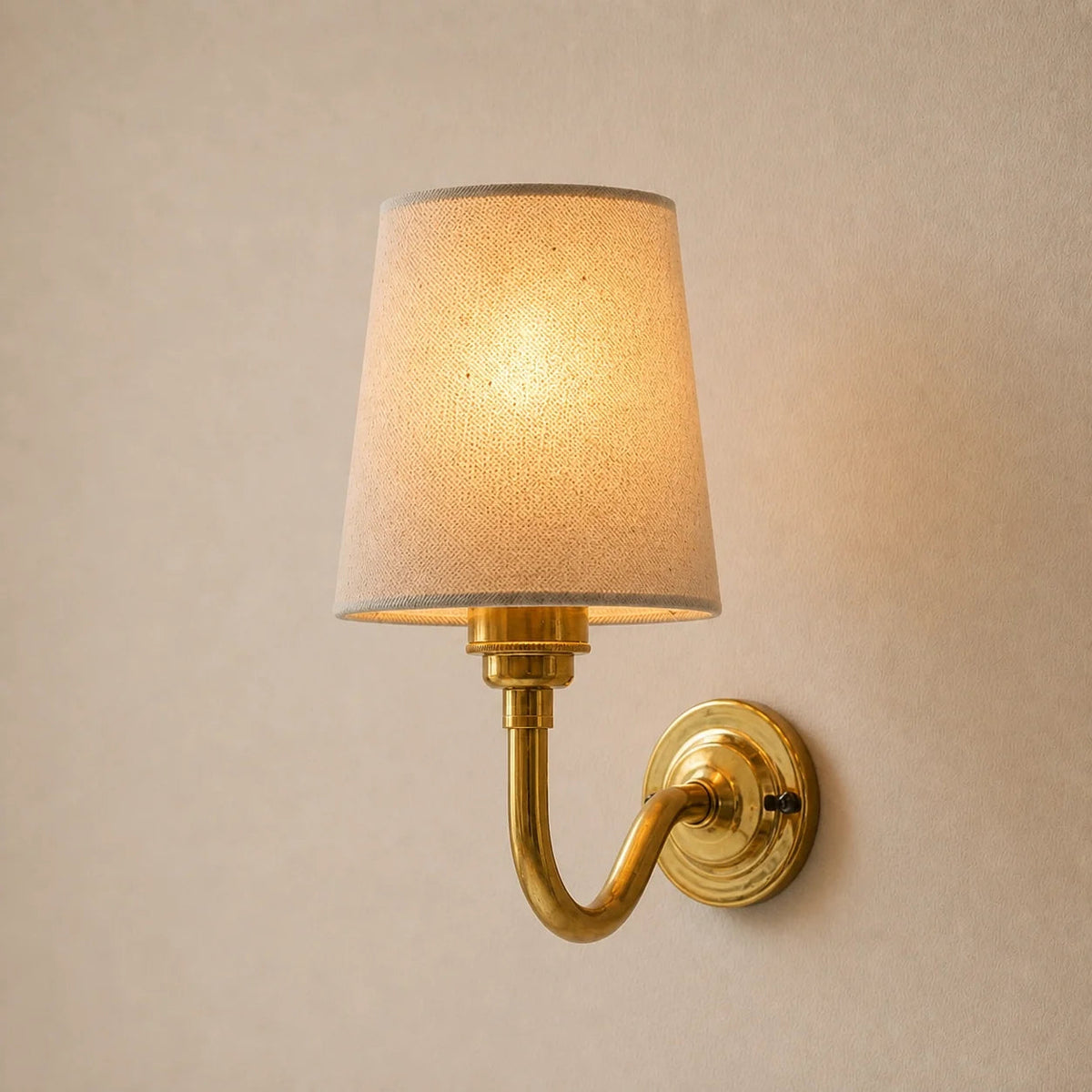 Brass wall sconce