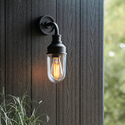 Glass wall light with a metal bracket