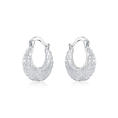Boucles d’oreilles créoles à motif floral