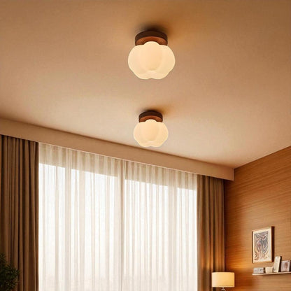 Ceiling lamp with a floral shade