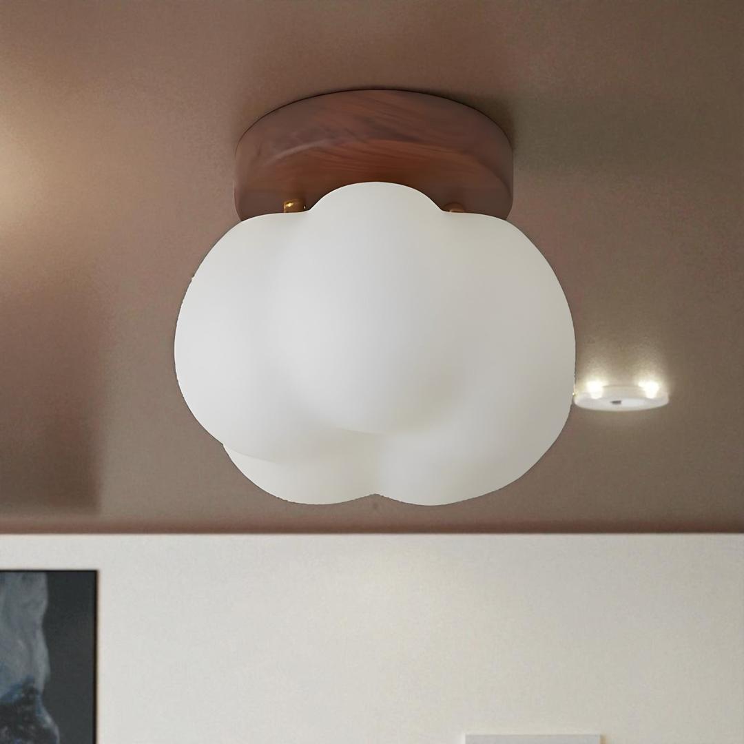 Ceiling lamp with a floral shade