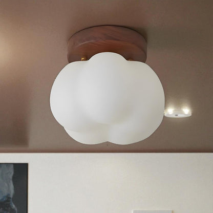 Ceiling lamp with a floral shade