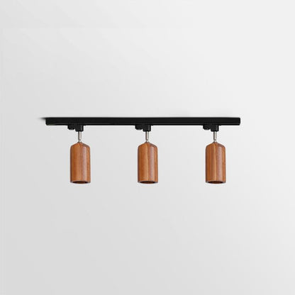Lampa szynowa z drewnianymi kloszami