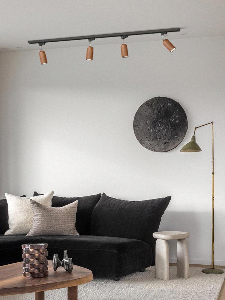 Lampa szynowa z drewnianymi kloszami