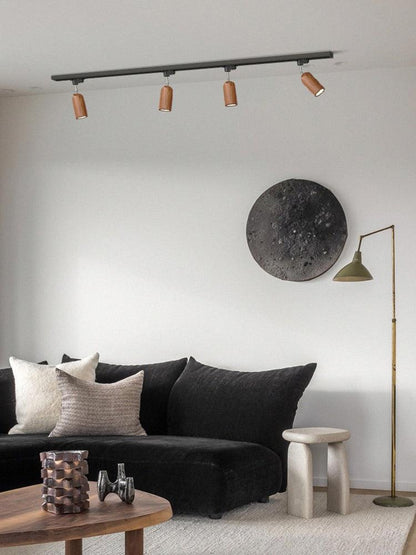 Lampa szynowa z drewnianymi kloszami