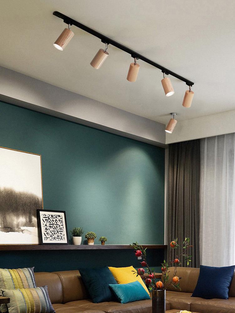 Lampa szynowa z drewnianymi kloszami