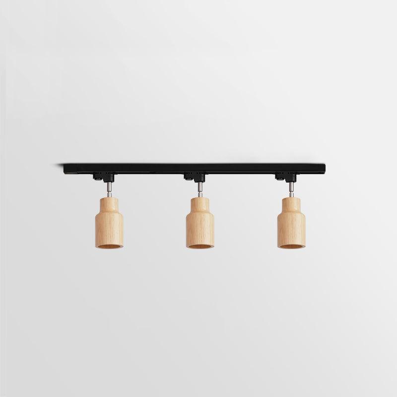 Lampa szynowa z drewnianymi kloszami